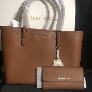 Brown/tan Michael Kors purse and wallet set